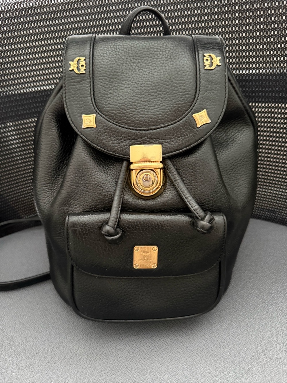 MCM Black Pebbled Leather Mini Drawstring Backpack with Gold Hardware